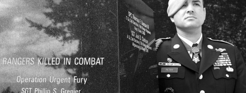 Leroy Petry standing next to Leroy Monument